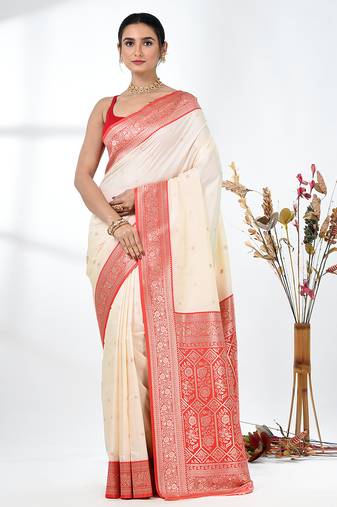 elegant off-white tussar silk blend saree with red zari border