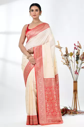 elegant off-white tussar silk blend saree with red zari border