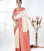 elegant off-white tussar silk blend saree with red zari border