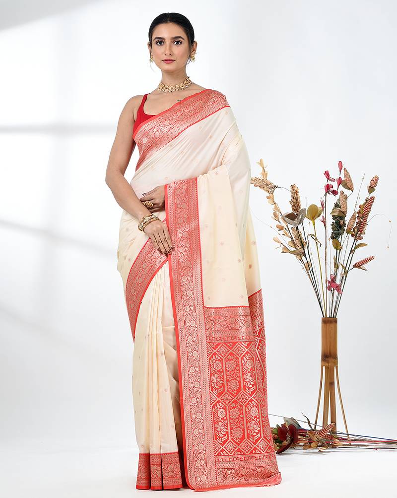 elegant off-white tussar silk blend saree with red zari border