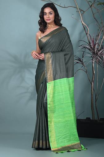 emerald green viscose saree with gheecha pallu and golden border