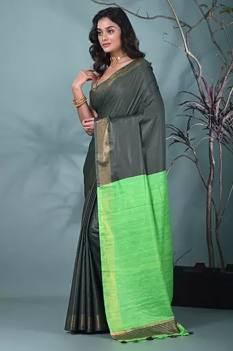 emerald green viscose saree with gheecha pallu and golden border