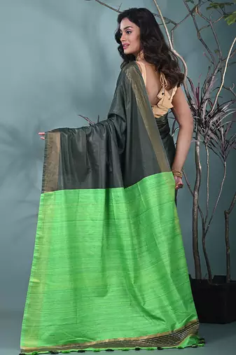emerald green viscose saree with gheecha pallu and golden border