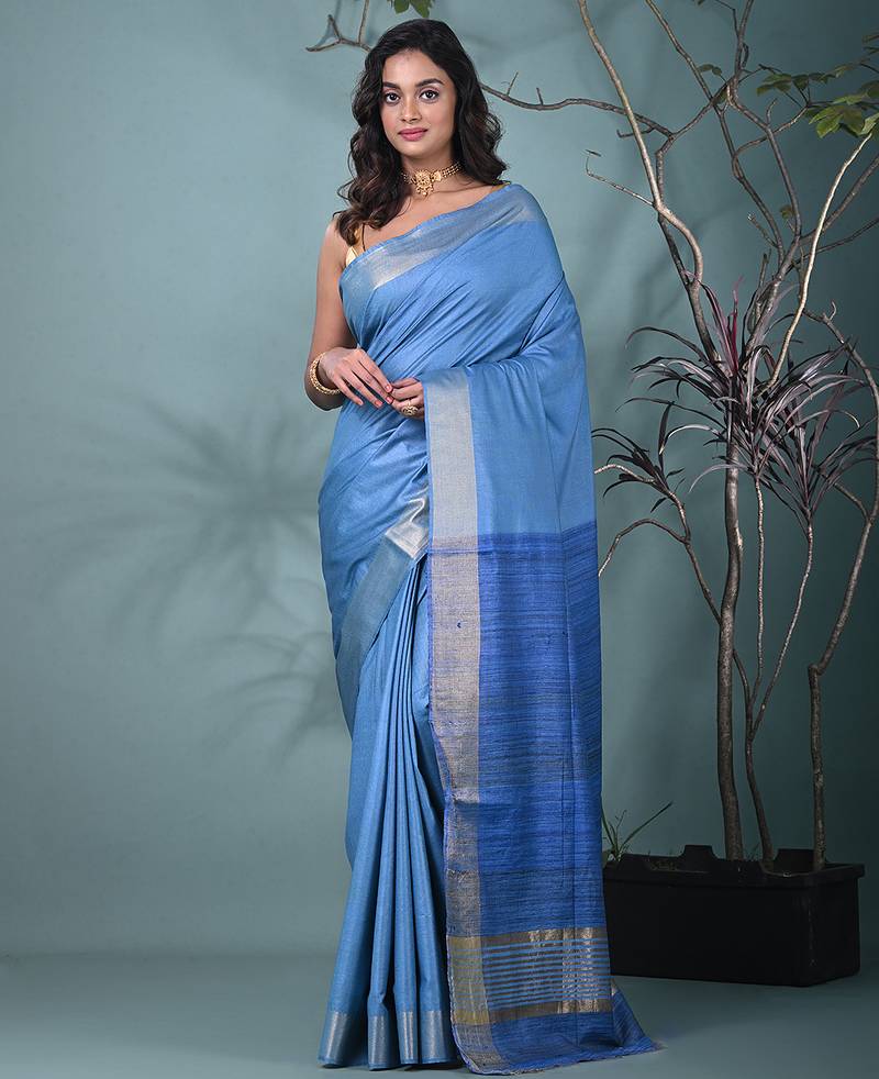 baby blue viscose saree with gheecha pallu and golden border