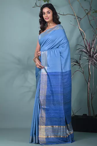 baby blue viscose saree with gheecha pallu and golden border