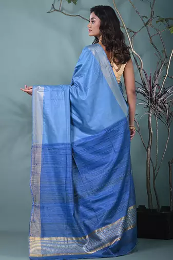 baby blue viscose saree with gheecha pallu and golden border