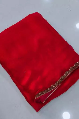 Red color fendy chiffon saree with running blouse