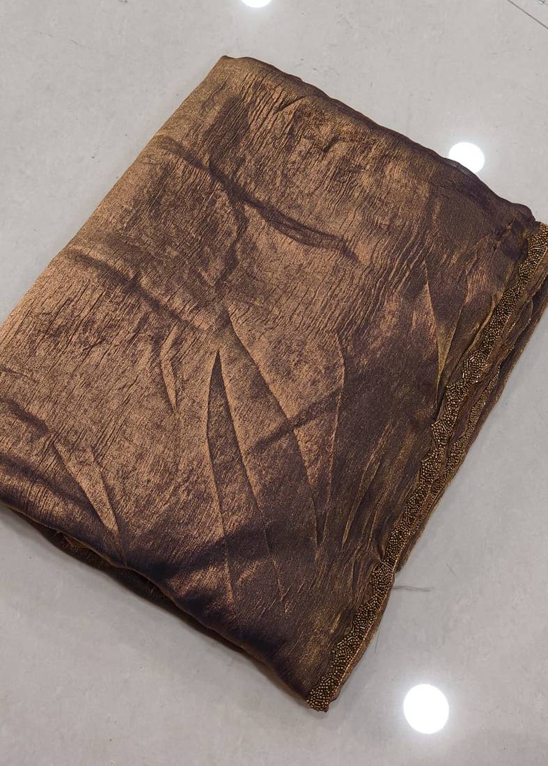 Brown color fendy chiffon saree with running blouse