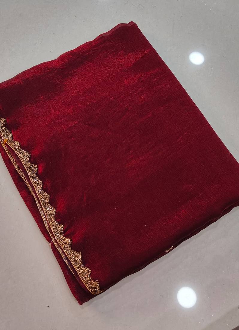 Maroon color fendy chiffon saree with running blouse