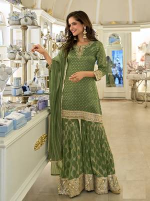 green embroidered palazzo style salwar suit 1