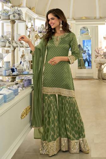 green embroidered palazzo style salwar suit
