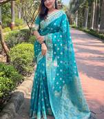 sky blue color organza fabric woven designer ceremonial partywear saree
