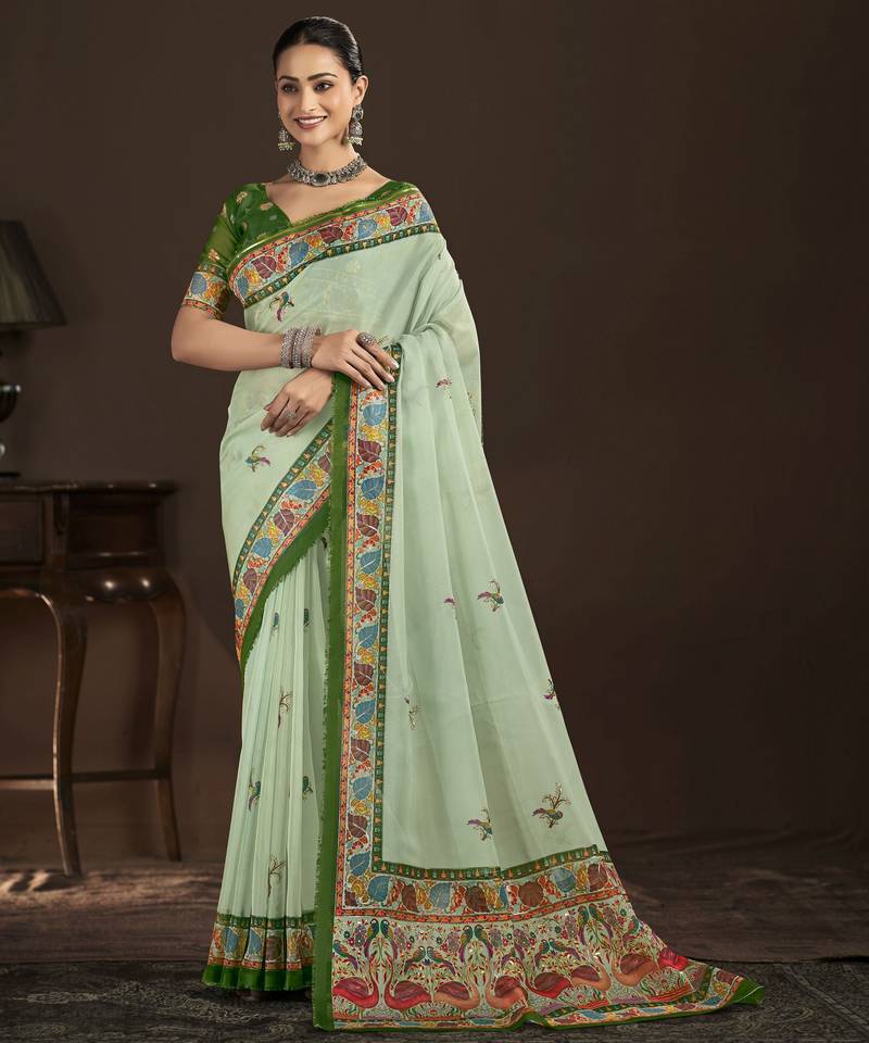 pista green color crepe silk blend fabric designer foil printed saree