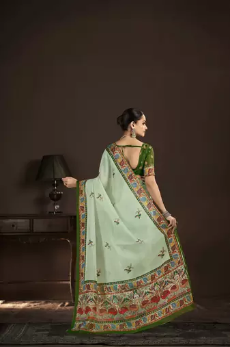 pista green crepe silk blend foil printed saree