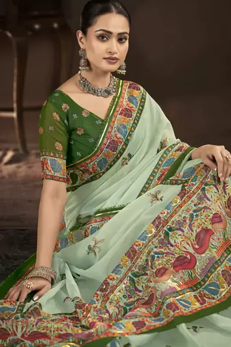 pista green crepe silk blend foil printed saree
