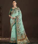 sky blue color crepe silk blend fabric designer foil printed saree