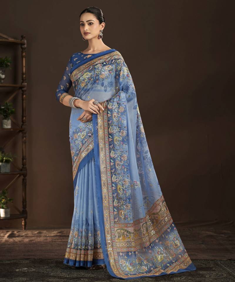 blue color crepe silk blend fabric designer foil printed saree