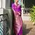 purple color banarasi silk blend fabric designer partywear saree