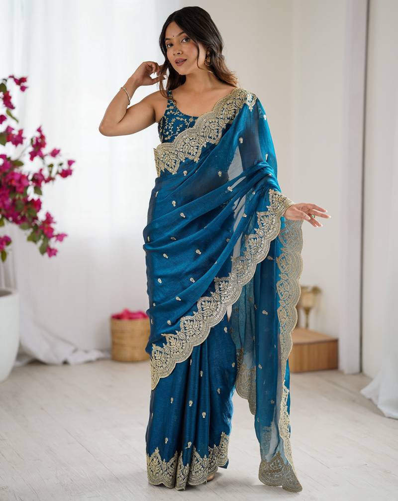 teal color fendy chiffon fabric beautiful embroidered saree