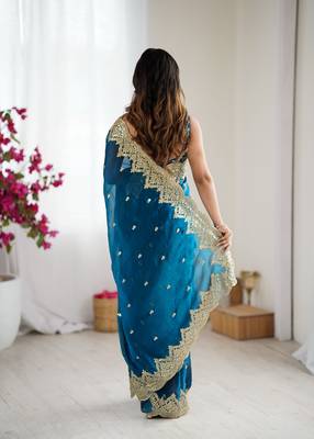 Teal color fendy chiffon fabric beautiful embroidered saree 3