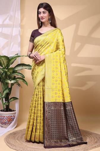yellow color lichi art silk fabric beautiful woven designer saree