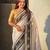 cream color soft silk blend woven designer saree for ceremonial looks
