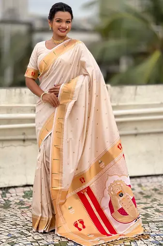 cream color soft silk blend fabric  woven paithani designer cultural rich saree