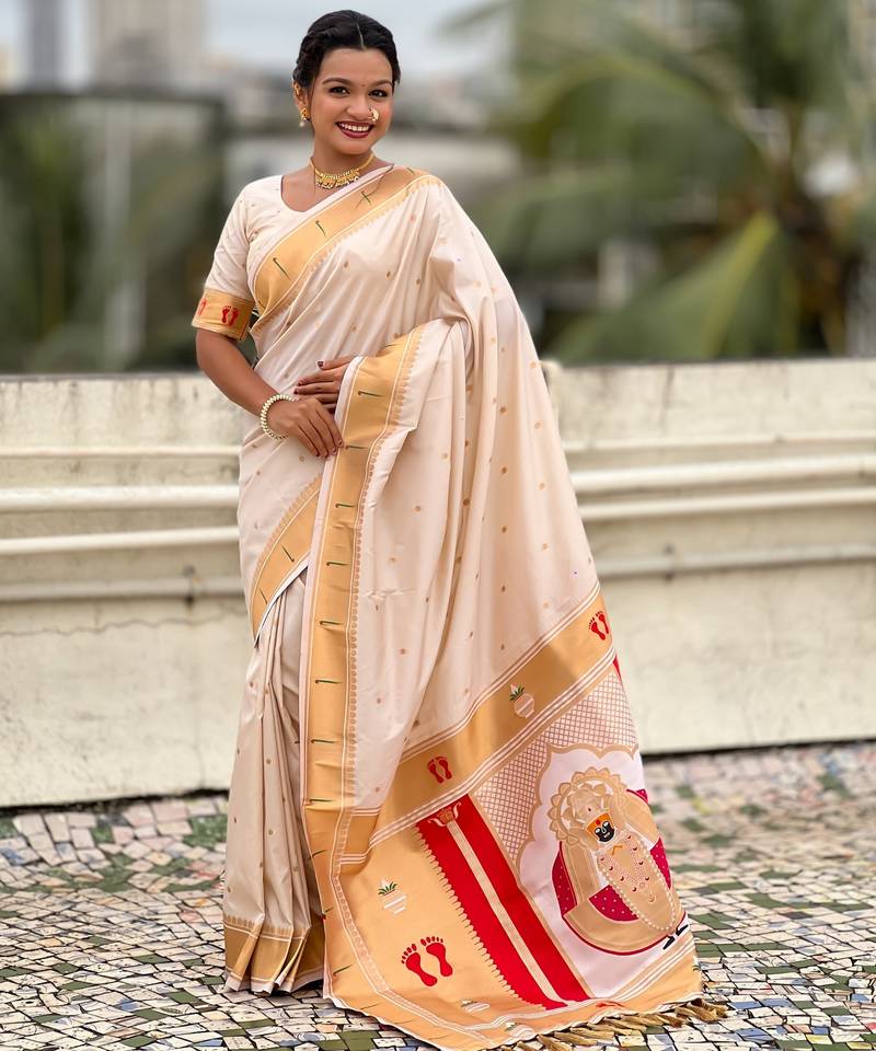cream color soft silk blend fabric  woven paithani designer cultural rich saree