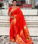 orange color soft silk blend fabric  woven paithani designer cultural rich saree