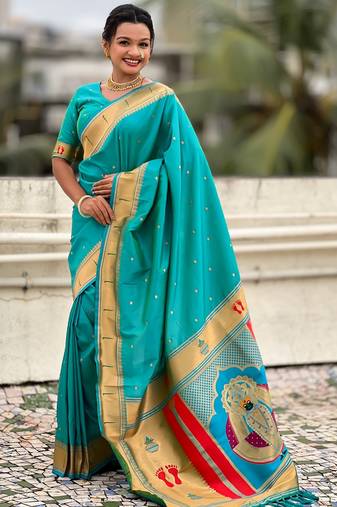 sea green color soft silk blend fabric  woven paithani designer cultural rich saree