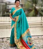 sea green color soft silk blend fabric  woven paithani designer cultural rich saree
