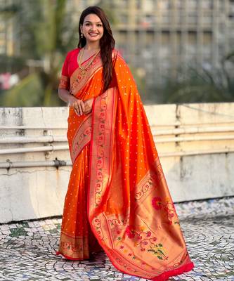 orange soft silk blend woven partywear saree 1