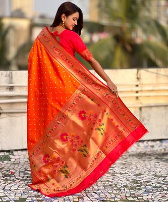 orange soft silk blend woven partywear saree 2