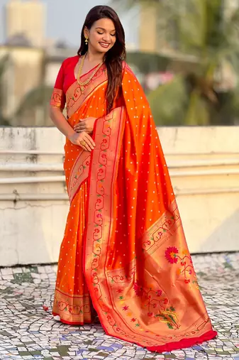 orange soft silk blend woven partywear saree