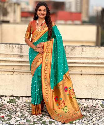 sea green soft silk blend woven partywear saree 1