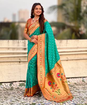 sea green soft silk blend woven partywear saree 4