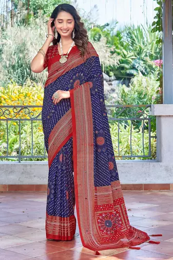 blue color velvet tussar silk blend fabric tradtional woven saree with bandhej print