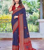 blue color velvet tussar silk blend fabric tradtional woven saree with bandhej print