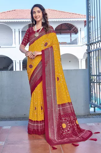yellow color velvet tussar silk blend fabric tradtional woven saree with bandhej print