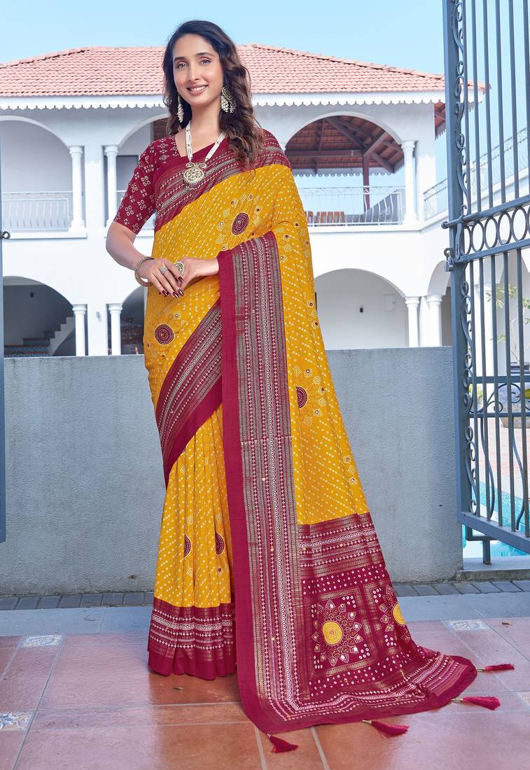 yellow color velvet tussar silk blend fabric tradtional woven saree with bandhej print
