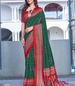 green color velvet tussar silk blend fabric tradtional woven saree with bandhej print