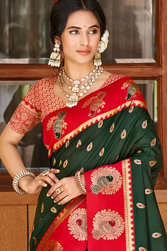 dark green ethnic woven partywear saree