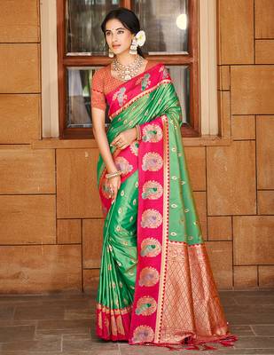 green ethnic woven partywear saree 1