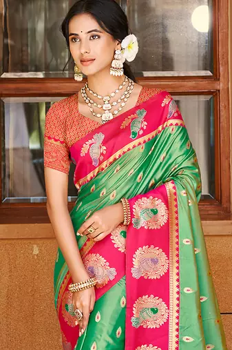 green ethnic woven partywear saree