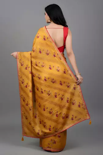 Yellow embroidered satin saree