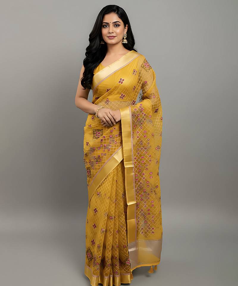 Yellow embroidered organza saree