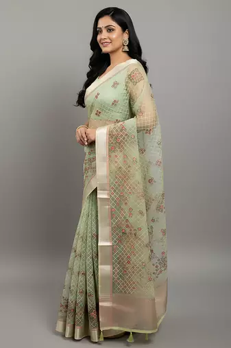 Green embroidered organza saree