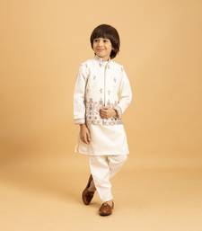white satin boys kurta pajama set with thread embroidered jacket