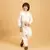 white satin boys kurta pajama set with thread embroidered jacket