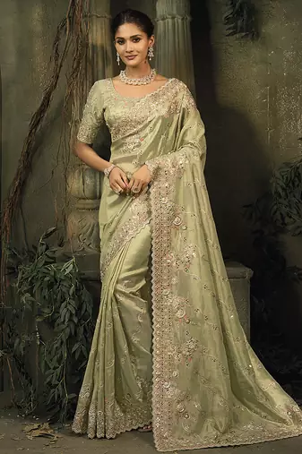 Pista green silk blend saree with embroidered jari and cut-dana work